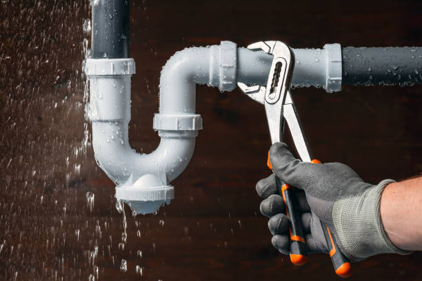 Professional Emergency Plumber technician working in Upland, PA